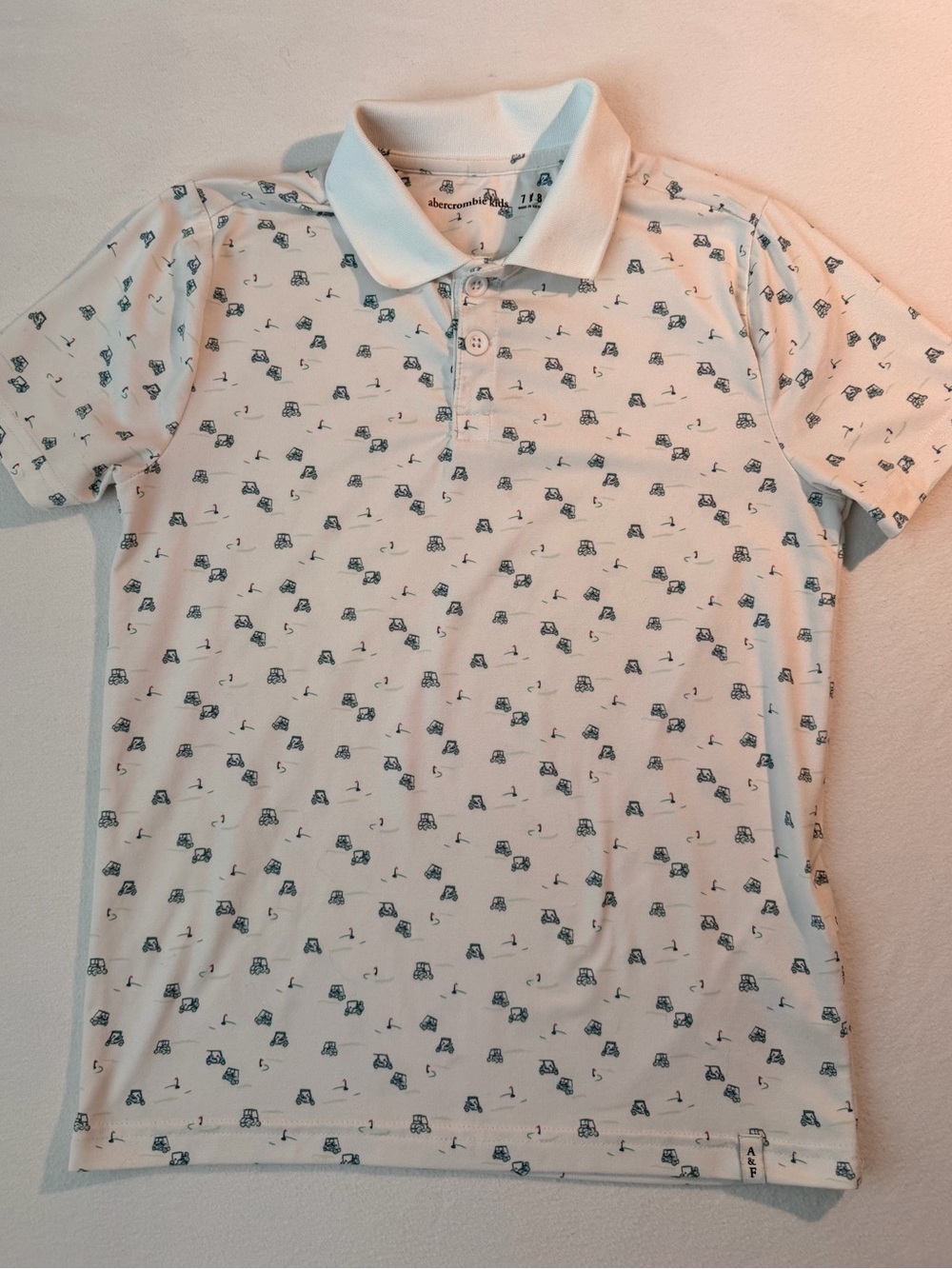 Like New White Boy’s Abercrombie Kids Polo Shirt with Golf Print